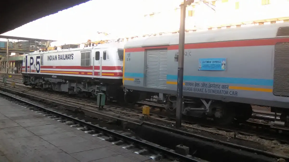 Gatimaan Express train standing at a railway platform in daylight