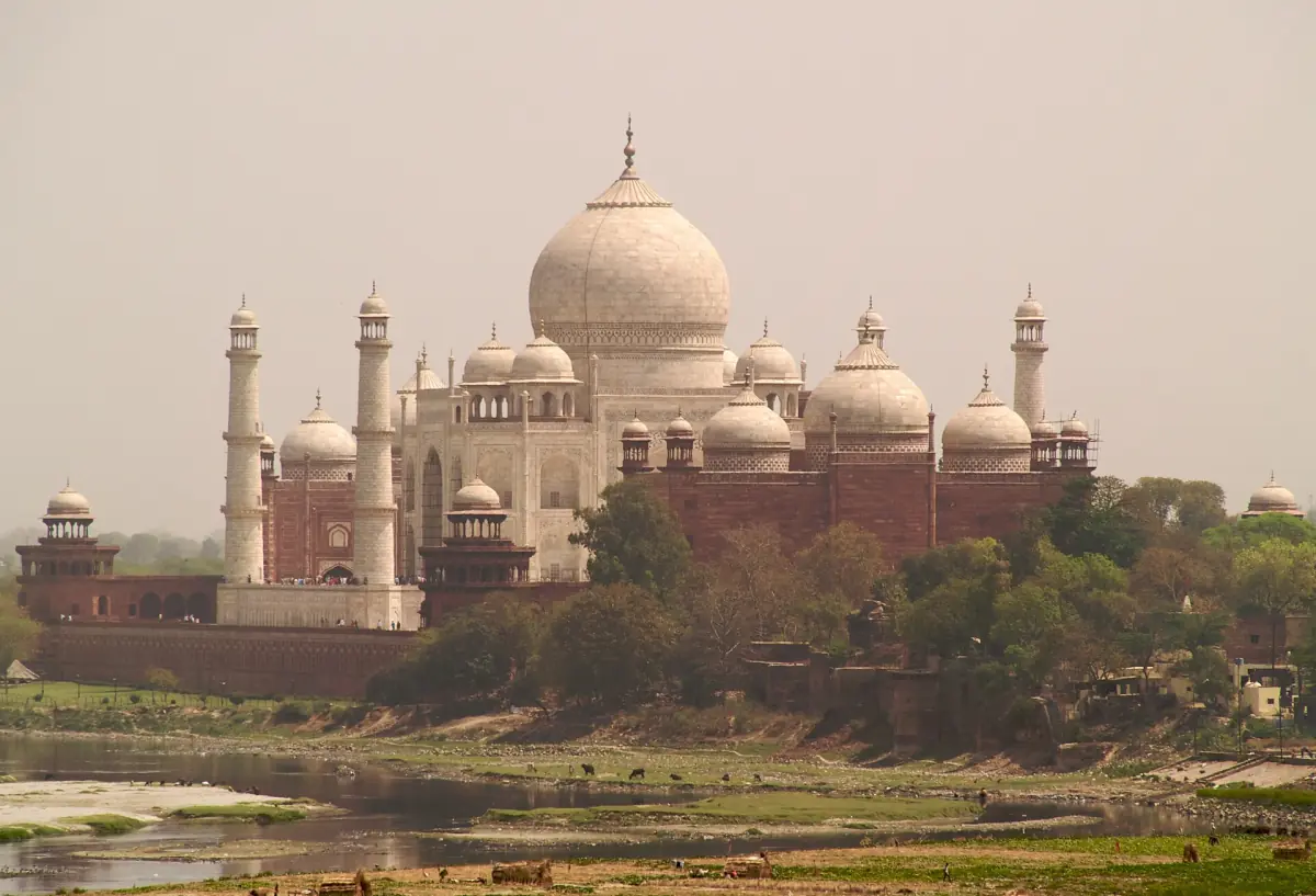 Taj Mahal dome and minarets across the Yamuna as seen from Agra Fort